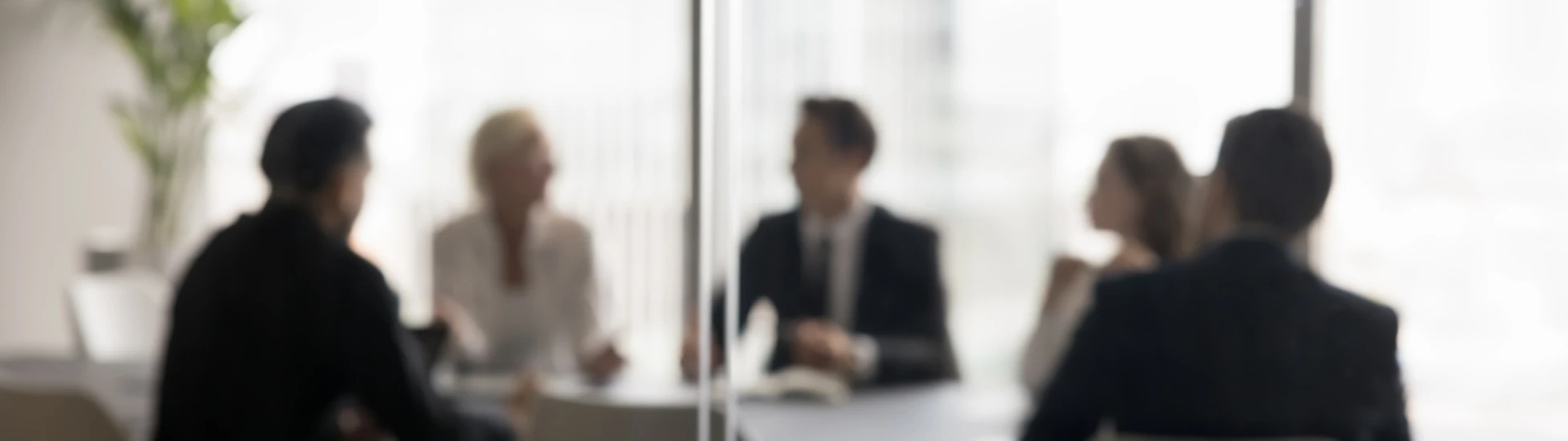 meeting behind glass