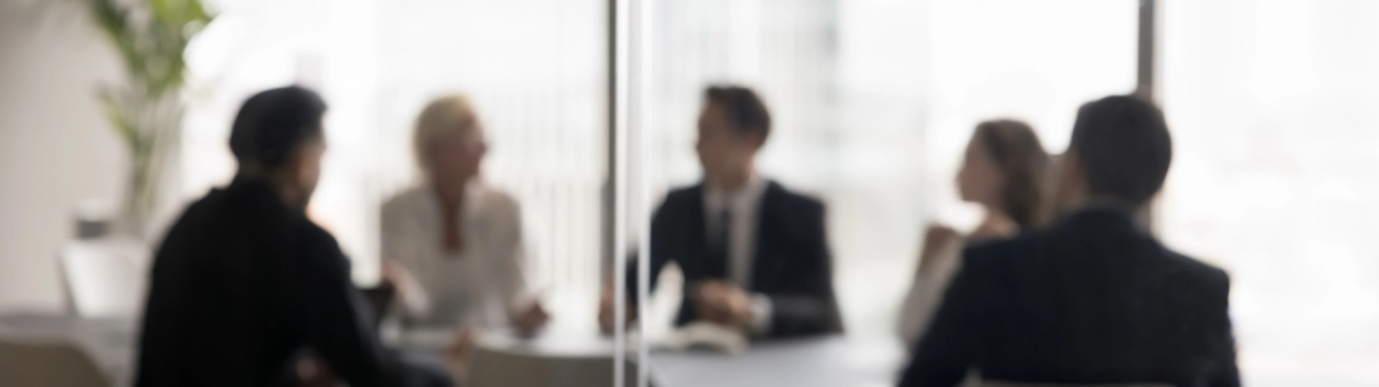 meeting behind glass